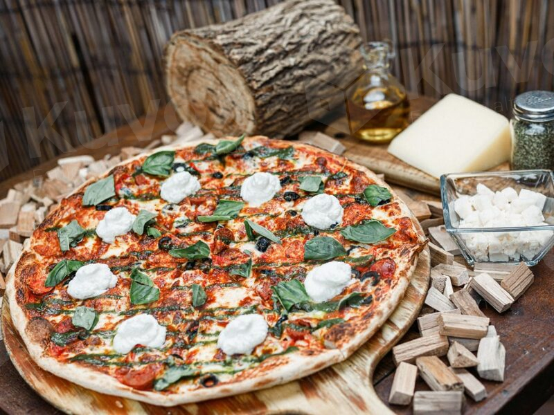 Pizza margarita a la leña